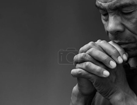 Photo for Desperated man praying to God - Royalty Free Image