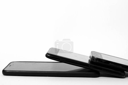 old mobile phones on white background