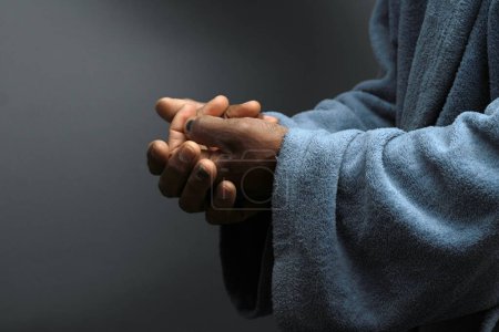 Photo for Man praying to god with hands, closeup - Royalty Free Image