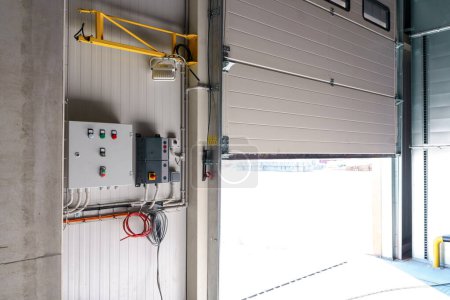 Control units for gates and loading bridges. Control system for warehouse loading bays