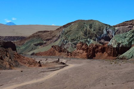 Desert landscape with dirt road in the Rainbow Valley, Valle Arcoiris, near San Pedro de Atacama, Regin de Antofagasta, Chile, South America 