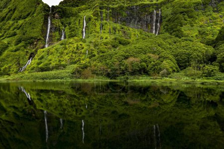 Waterfalls with lake Poo Ribeira do Ferreiro in green landscape, Poco da Alagoinha, Fajzinha, Flores Island, Azores, Portugal, Europe 