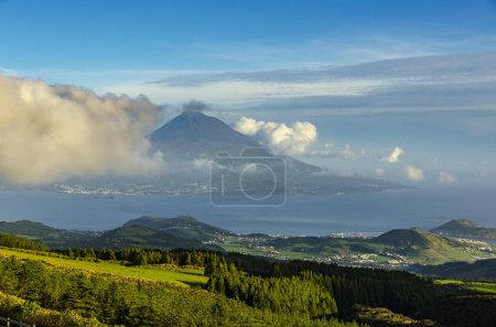 View of volcano Ponta do Pico with clouds, island of Faial, Azores, Portugal, Europe