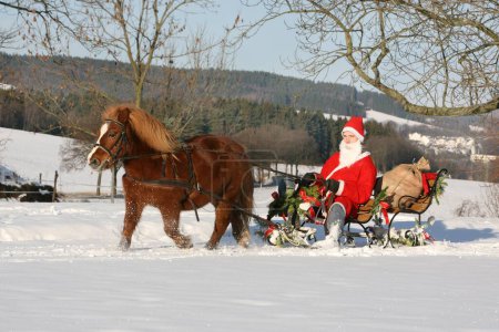 Santa Claus on Christmas sleigh ride