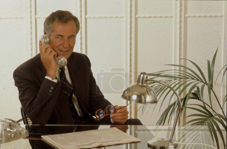 Man on the phone, office Office scene