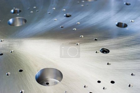 metal surface with drilled holes