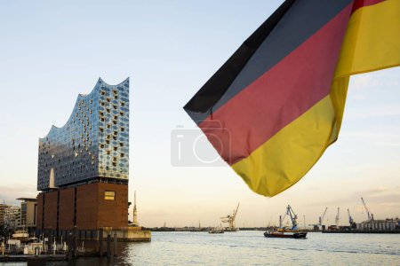 Elbphilharmonie, reflection and German flag, architects Herzog & De Meuron, Hafencity, Hamburg, Germany, Europe
