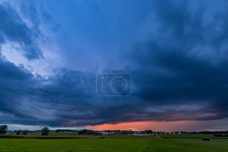 Thunderstorm sky with small village and meadows landscape, Kngetried, Unterallgu, Bavaria, Germany, Europe 