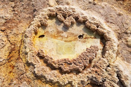 Salt deposits, smiley face from a salt crust, geothermal area Dallol