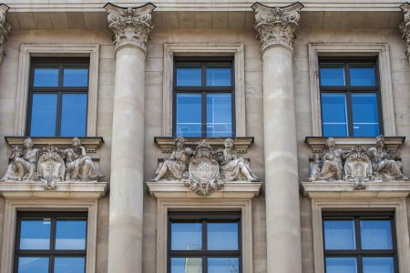Facade with decorative figures, Bayerische Staatsbank, today the Lovlace Building, Munich, Upper Bavaria, Bavaria, Germany, Europe