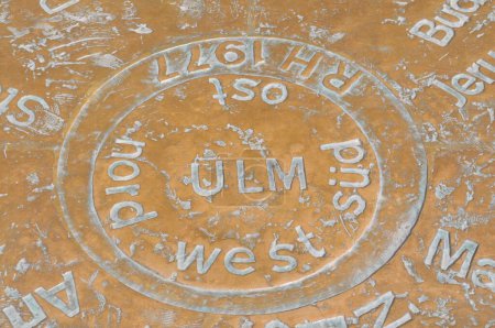 In Muensterplatz square a copper plate shows the distances to other towns, Ulm, Baden-Wuerttemberg, Germany, Europe