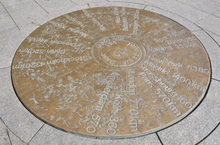 In Muensterplatz square a copper plate shows the distances to other towns, Ulm, Baden-Wuerttemberg, Germany, Europe