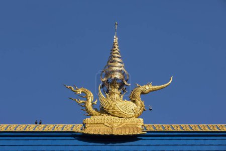 Golden decorated mythical phoenix figure on the roof of Wat Rong Seur Ten, Blue Temple, Chiang Rai, Northern Thailand, Thailand, Asia