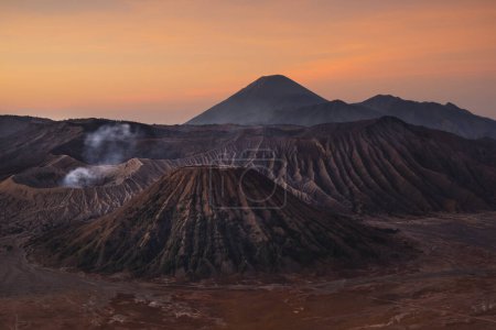 Volcanic pipes with smoking volcano Gunung Bromo, Mt. Batok, Mt. Kursi, Mt. Gunung Semeru, National Park Bromo-Tengger-Semeru, Java, Indonesia, Asia