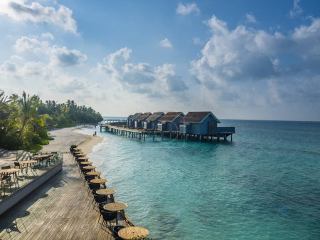 Hotel complex with stilt houses in turquoise water, resort, hotel island Kuramathi, Rsadoo atoll, Maldives, Asia