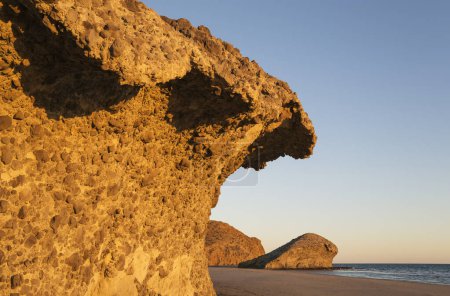 Fossilized lava tongues and walls at the beach Playa del Monsul, Nature Reserve Cabo de Gata-Nijar, Almeria province, Andalusia, Spain, Europe