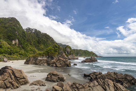 Rocks on the beach, rugged rocky coast in Paparoa National Park, West Coast region, South Island, New Zealand, Oceania