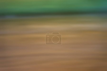 Abstract gradient blue, green and brown light background texture with horizontal motion blur