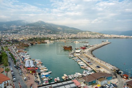 View of Alanya marina and walking path, one of the touristic districts of Antalya, from the Red Tower