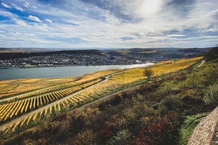 Photo for Panoramic view from Niederwald monument (germ. Niederwalddenkmal) to city of Bingen and Rheinhessen against blue sky with clouds - Royalty Free Image