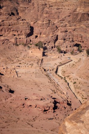 Photo for Scenic view of Colonnaded Street, Great Temple and Qasr al-Bint in the historic and archaeological city of Petra, Jordan from Al-Kubtha Trail - Royalty Free Image