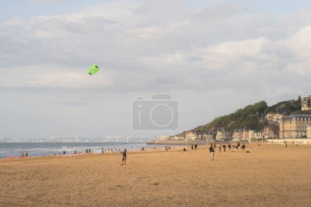 Photo for People into Diverse leisure activity on the Beach in Normandy, France - Royalty Free Image