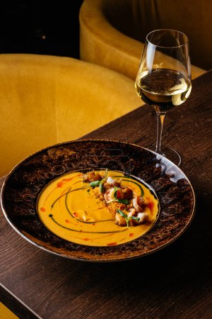 Photo for Pumpkin cream soup with shrimp - Royalty Free Image