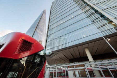 Photo for Bus parked in the bus station of London Bridge Station near The Shard - Royalty Free Image