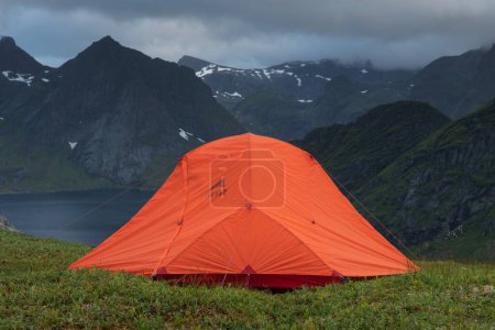 Photo for Tent camping in mountains of Kirkefjord, Lofoten Islands, Norway - Royalty Free Image
