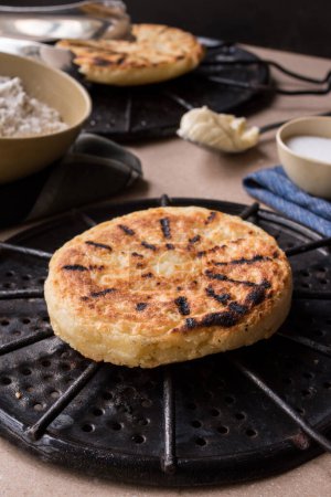 Photo for "Arepa" Clombian traditional food made with cheese - Royalty Free Image