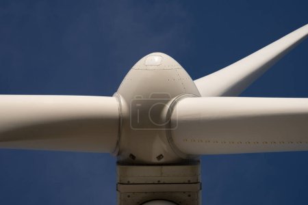 Photo for Close Up Shop of Modern Giant Wind Turbine Against Blue Sky - Royalty Free Image