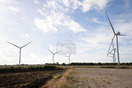 Photo for Wind farm in Denmark, supplying eco friendly electricity - Royalty Free Image