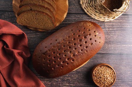 Photo for Homemade rye bread on a wooden board - Royalty Free Image