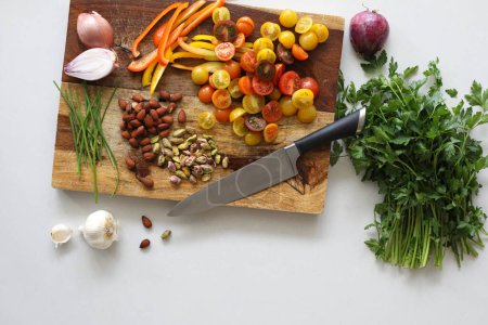Photo for Cutting board scene with fresh ingredients - Royalty Free Image