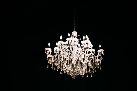 Photo for Crystal Chandelier With a Blackout Background - Royalty Free Image