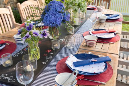 Photo for Festive Fourth of July party table settings - Royalty Free Image