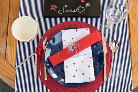 Photo for Overhead view of festive Fourth of July party table setting - Royalty Free Image