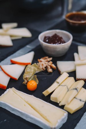 Photo for Table with different types of European cheeses - Royalty Free Image