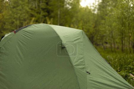 Photo for Tourist tent in forest. Tent for sleeping in nature. - Royalty Free Image