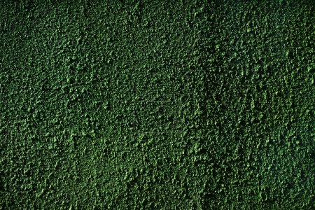 Téléchargez les photos : Green rough wall. Painted surface. Roughness texture. Finishing of putties. - en image libre de droit