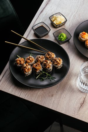 Foto de Sushi roll with eel on a plate.  asian restaurant menu - Imagen libre de derechos