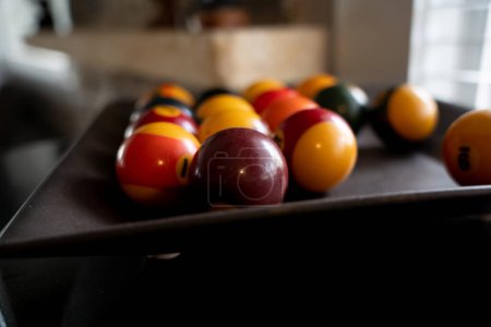 Photo for Pool balls in wooden tray - Royalty Free Image