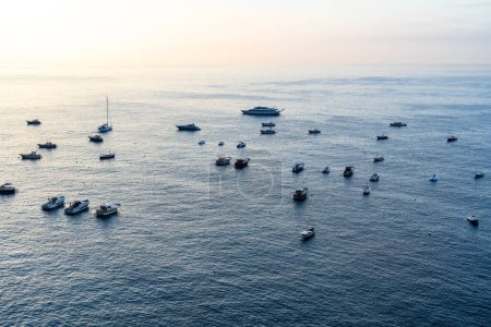 Téléchargez les photos : Boats on anchor in Positano early in the morning - en image libre de droit