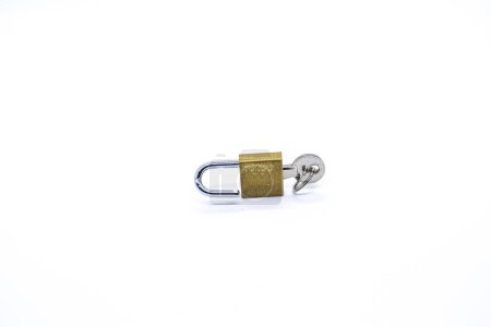 Photo for Key inside padlock on white background. - Royalty Free Image