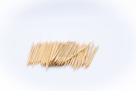 Photo for Toothpicks in the center of the image on white background - Royalty Free Image