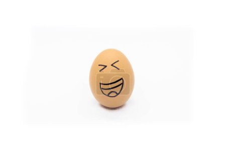 Foto de Egg with very happy face on white background - Imagen libre de derechos