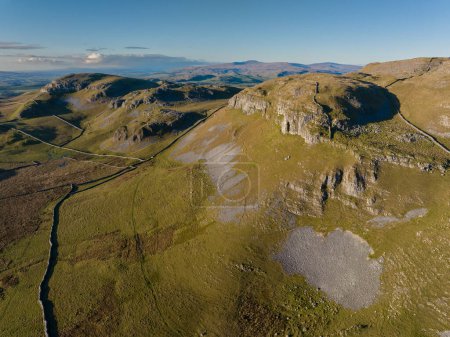 Téléchargez les photos : Aerial view of limestone hills called Sugar Loaf hill near settle, North Yorkshire - en image libre de droit