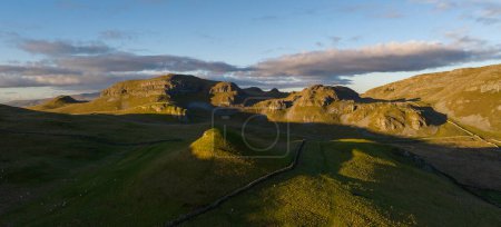 Photo for Aerial view of limestone hills called Sugar Loaf hill near settle, North Yorkshire - Royalty Free Image