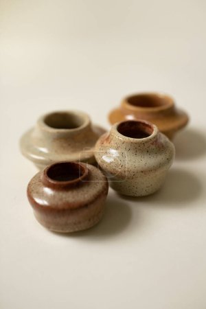 Photo for Simple Beginner Handmade Pottery Close Up of Little Clay Vases - Royalty Free Image