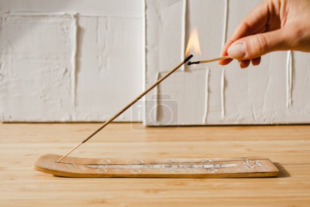 Téléchargez les photos : Person Lighting an Incense Meditation Rituals Spirituality - en image libre de droit
